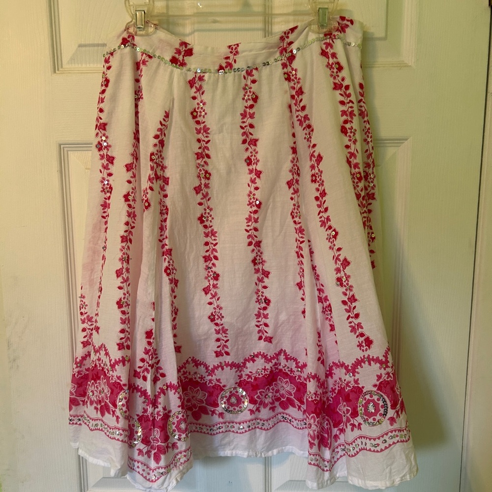 Very pretty cotton skirt with sequins. Has a built in slip
